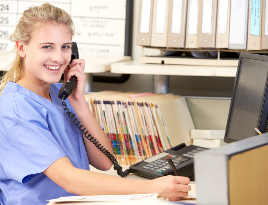 nurse working and talking by phone