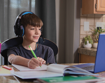 boy studying at home