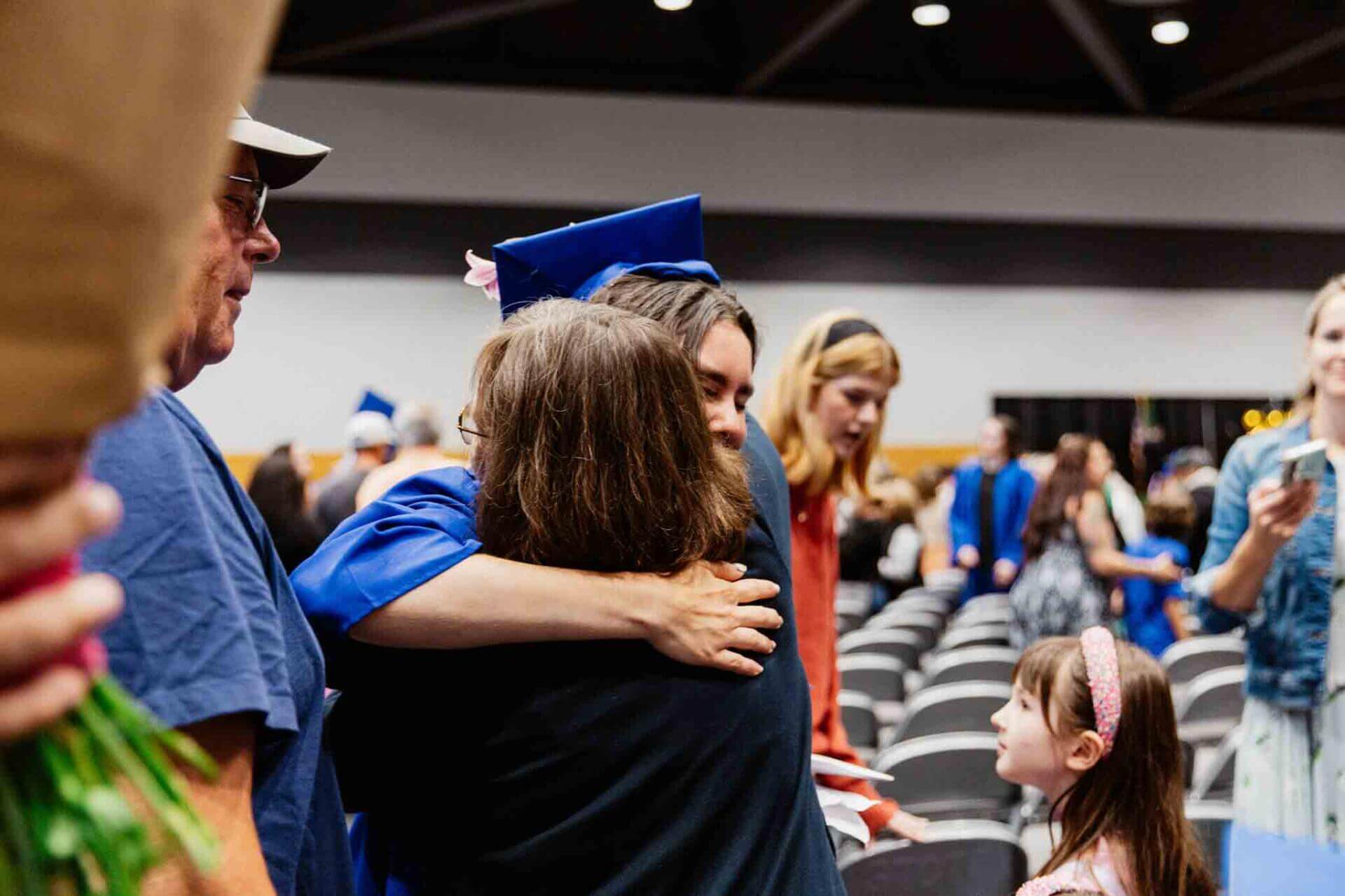 Student hugging her mother